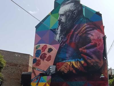 Kobra multicolor portrait tribute — Street art by Eduardo Kobra in Boulogne-sur-Mer