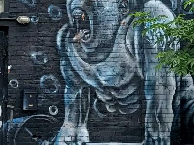 Blue Roaring Gorilla on Brick Wall — Street art in Berlin
