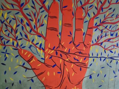 Hand with Colored Leaves — Street art in Strasbourg