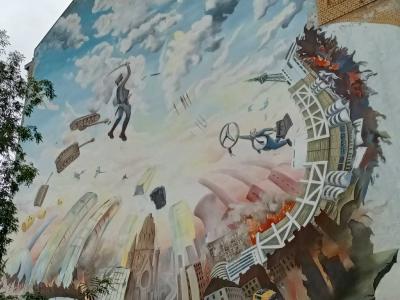 The City Sucked into the Whirlwind — Street art by Jadore Tong in Berlin