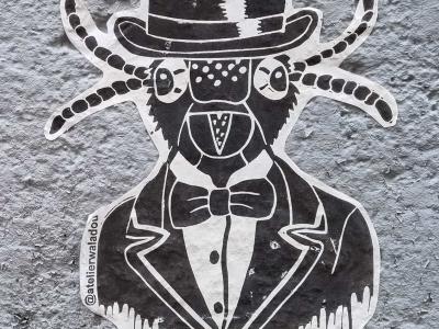 Insecte gentleman au chapeau melon — Street art à Clermont-Ferrand