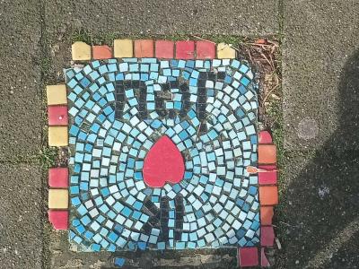 Red Heart in a Pavement Mosaic — Street art in Rotterdam