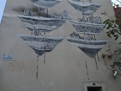 Iles flottantes avec villes miniatures — Street art de Daniel Muñoz à Angers