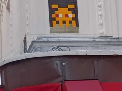 Yellow Space Invader on Rue Martel — Street art by Invader in Paris