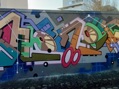 The Lettering and the Woman with Golden Earrings — Street art in Nantes