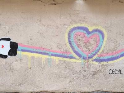 Astronaute Cecyl envoie son cœur coloré — Street art à Clermont-Ferrand