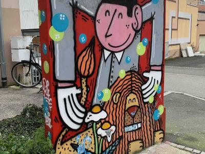 The Man and the Orange Dog — Street art in Belfort
