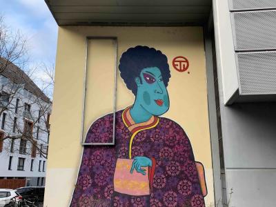 The Figure in the Flowered Coat — Street art in Strasbourg
