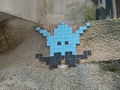 Blue Pixel Art Creature on Wall — Street art in Nantes