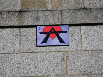 A2 on a purple background — Street art by A2 in Rennes