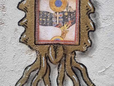 Golden Janus and Mystical Illumination — Street art by Codex Urbanus in Clermont-Ferrand