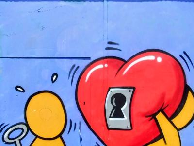 Giant Heart Carried by Two Figures — Street art by Jace in Saint-Denis
