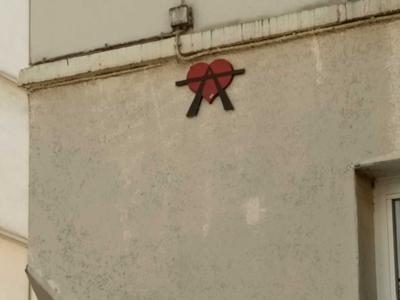 A2 Red Sticker Paris — Street art by A2 in Paris