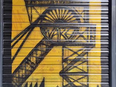 Industrial Headframe in Yellow Stencil — Street art in Clermont-Ferrand