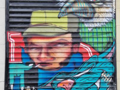 The Man in the Cap and the Fish — Street art in Grenoble