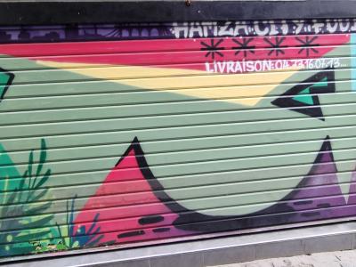 Colorful Hamza City Food Shutter — Street art in Clermont-Ferrand