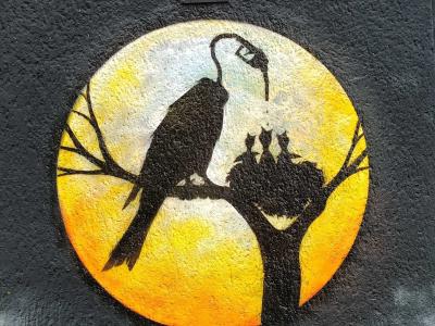 Bird Feeding with Fuel Pump Beak — Street art in Berlin
