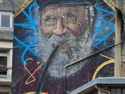 The Fisherman — Street art by Rast in Morlaix