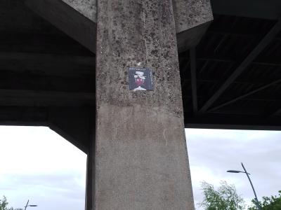 Sticker on the Viaduct Pier — Street art in Trélazé