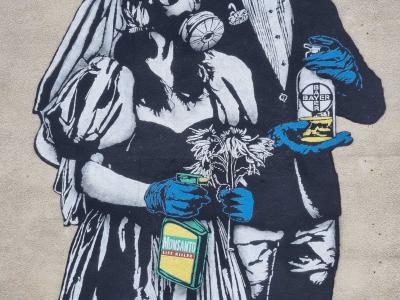 Couple with Gas Mask and Flower — Street art by Goin in Le Pont-de-Claix
