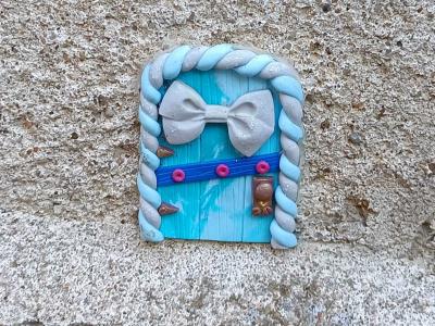 Mini sticker bleu Florizale — Street art de Florizale à Bourges