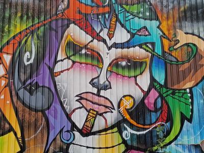 Psychedelic Multicolored Female Portrait — Street art in Berlin