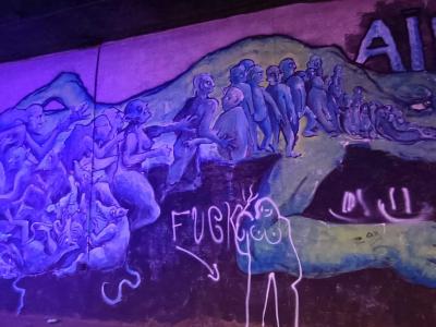 Giant Creature Carrying Wandering Souls — Street art in Paris