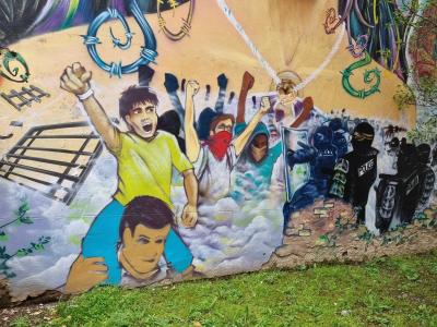 Protesters Facing Police — Street art in Grenoble