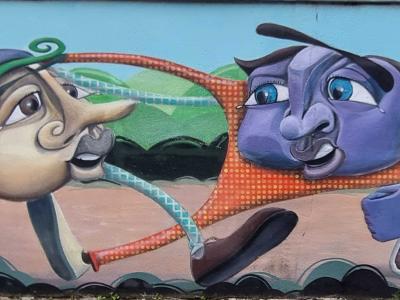 Two Heads Face to Face — Street art in Le Pont-de-Claix