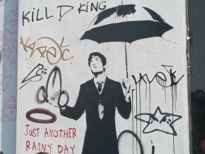 Man with Umbrella Rainy Day — Street art in London