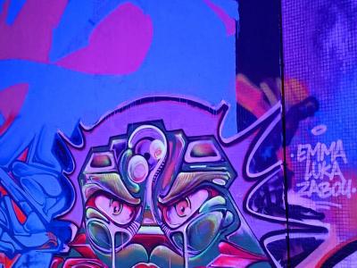 Fantastical Creature with Sharp Fangs — Street art in Paris