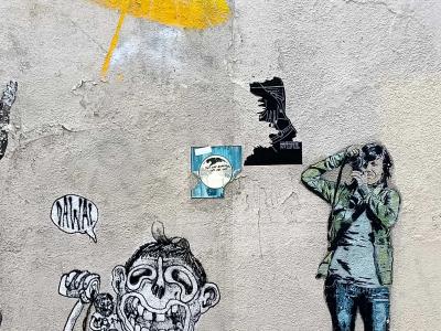 Yellow Umbrella and Photographer on Wall — Street art in Paris