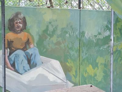 Woman on White Bed Introspective — Street art in Berlin