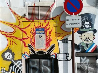Graffiti urbain d'action - figures explosives — Street art à Nantes
