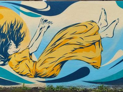 Woman in the Waves and Sunset — Street art in Vichy