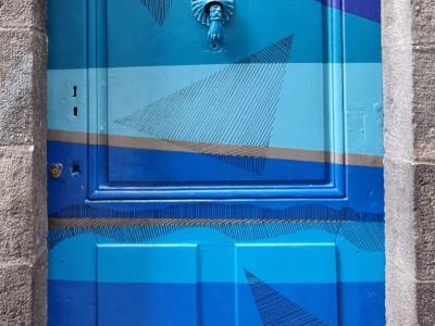 Blue Door with Geometric Triangles — Street art in Clermont-Ferrand