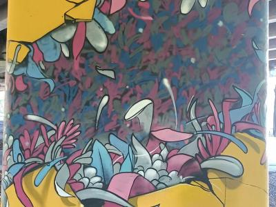 Floral Explosion in a Cracked Pillar — Street art in Rīga