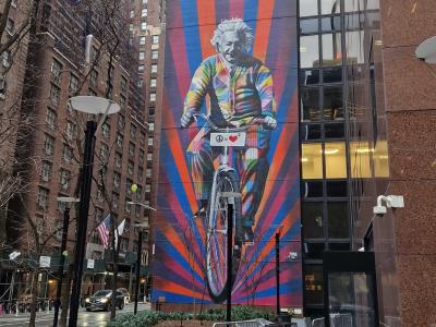 Rainbow Cyclist Woman Mural by Eduardo Kobra — Street art by Eduardo Kobra in New York