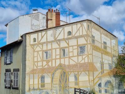 Trompe-l'œil moulin à eau — Street art à Chamalières