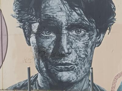 Man's Face in Grey-Blue Monochrome — Street art in Lisboa