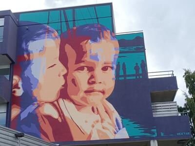 Two children at the harbour, by Hektor — Street art by Hektor in Yffiniac
