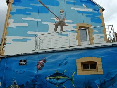 Le pêcheur — Street art by TSF Crew in Binic-Étables-sur-Mer