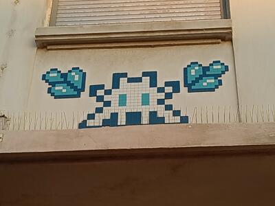 White Invader on Rue de Suez — Street art by Invader in Marseille