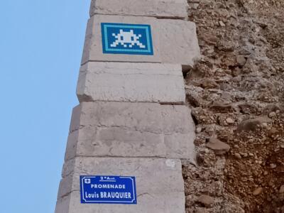 Invader on a Tourette pillar — Street art by Invader in Marseille