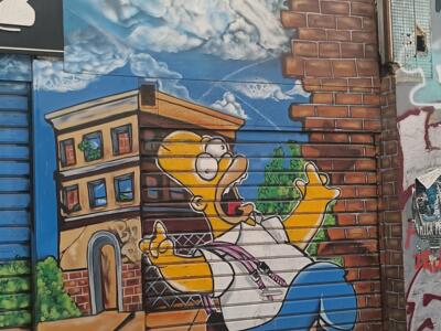 Homer Simpson mid-run — Street art in Marseille