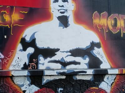 Stencilled boxer with an orange halo — Street art in Marseille