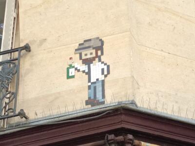 The man with a cap and a bottle — Street art in Paris