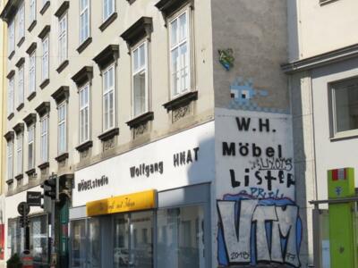 WN_55, Space Invader on Burggasse — Street art by Invader in Wien