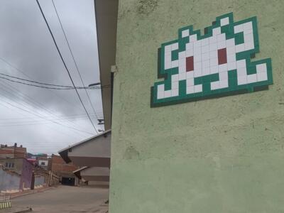 POTI_50, Space Invader on Plaza El Minero — Street art by Invader in Potosí