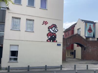 AMI_06, Space Invader de la rue des Coches — Street art de Invader à Amiens